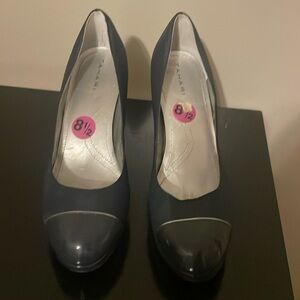 Tahari pumps style shoes.  Navy blue.  8.5